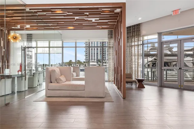 a view of swimming pool with outdoor seating and city view