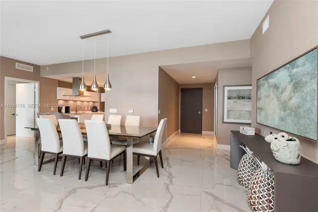 a view of a dining room with furniture