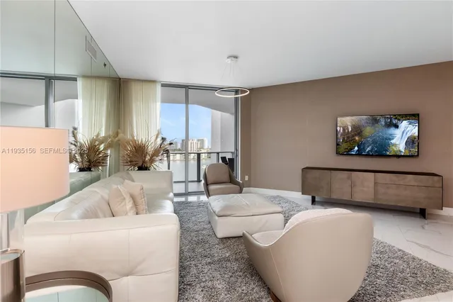 a living room with furniture and a couch