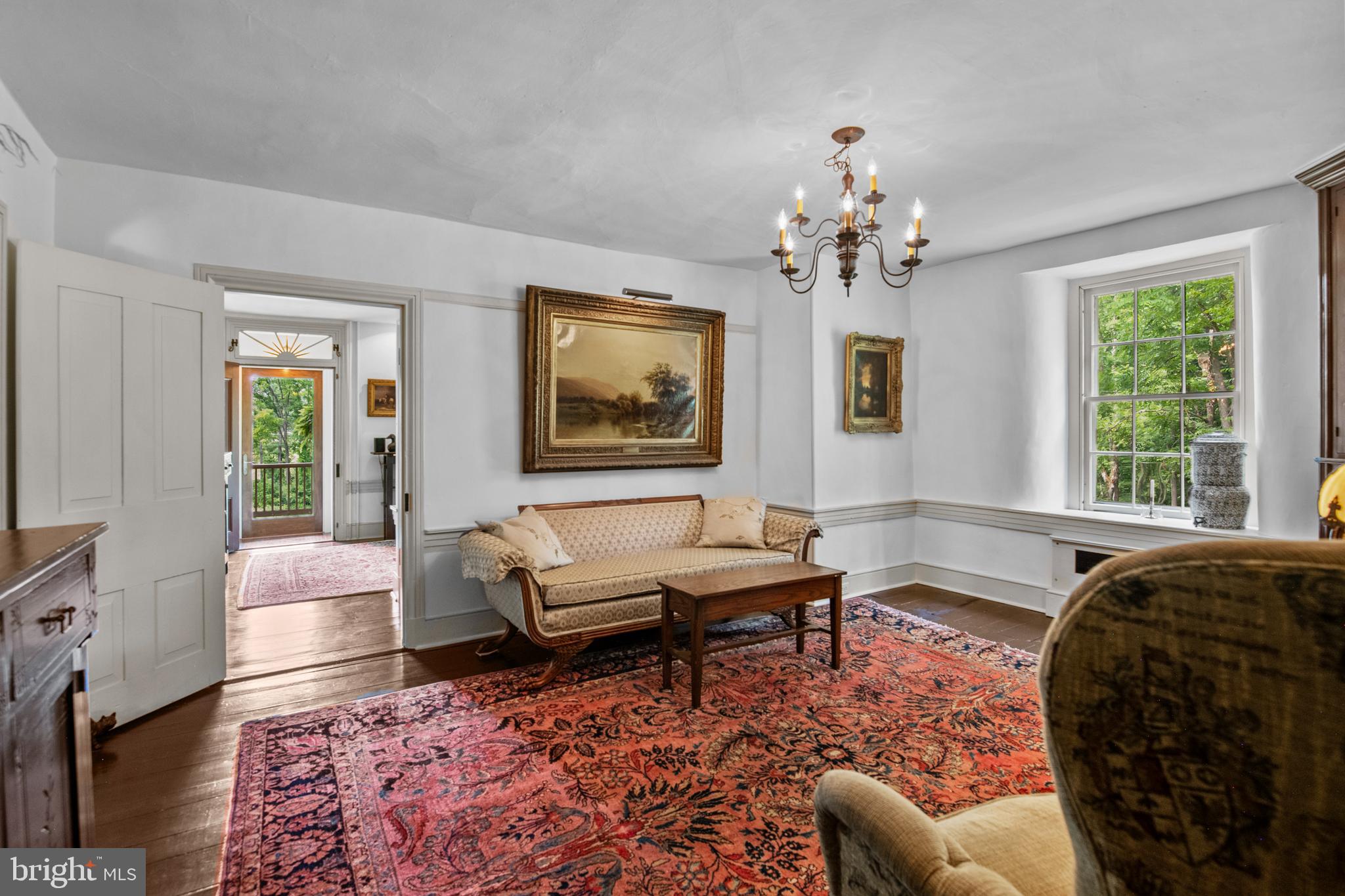 139 Mine Road Oley, PA 19547 - Photo 15 of 86 a living room with furniture and a chandelier