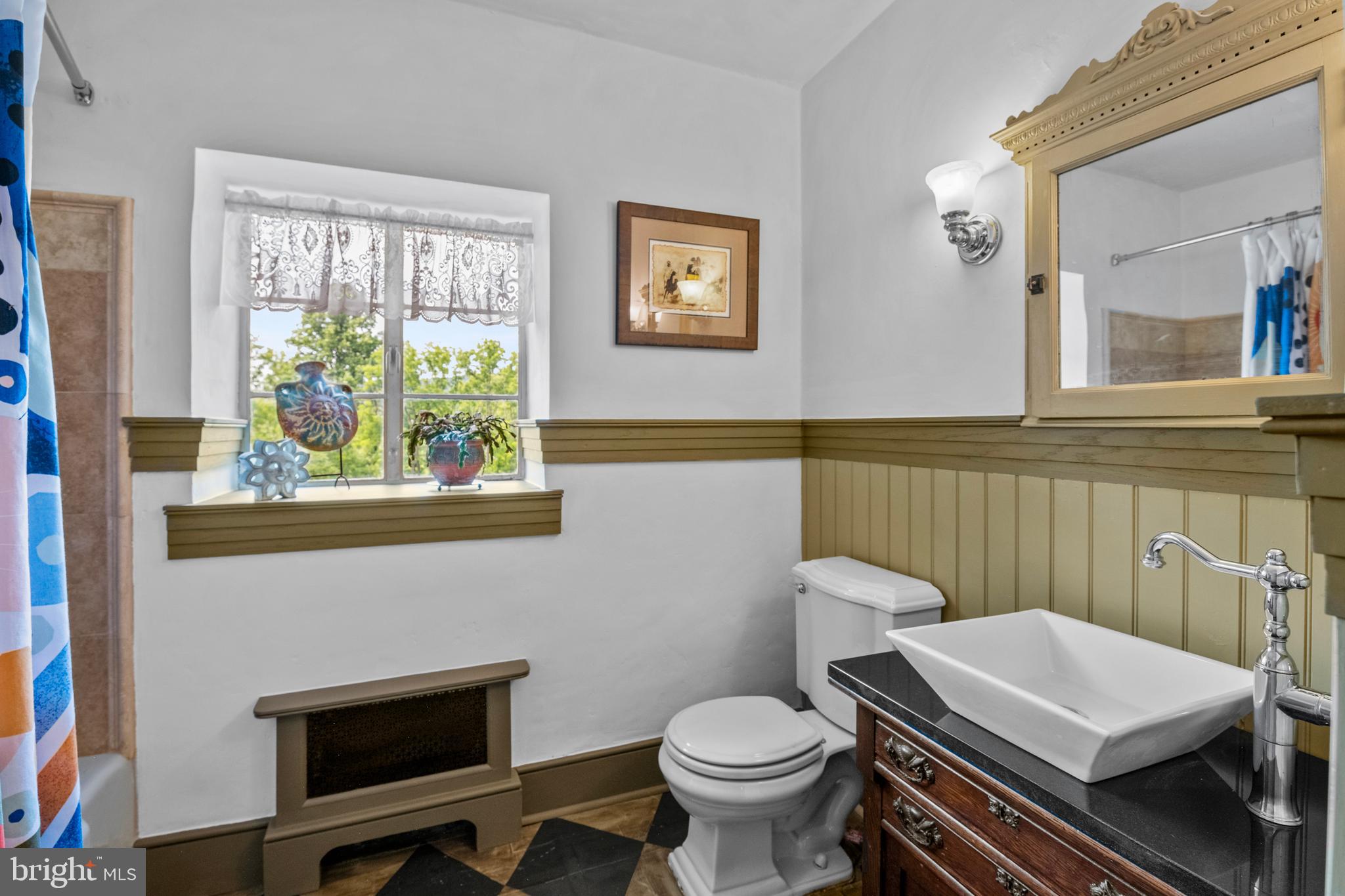 139 Mine Road Oley, PA 19547 - Photo 40 of 86 a bathroom with a toilet a sink and a window