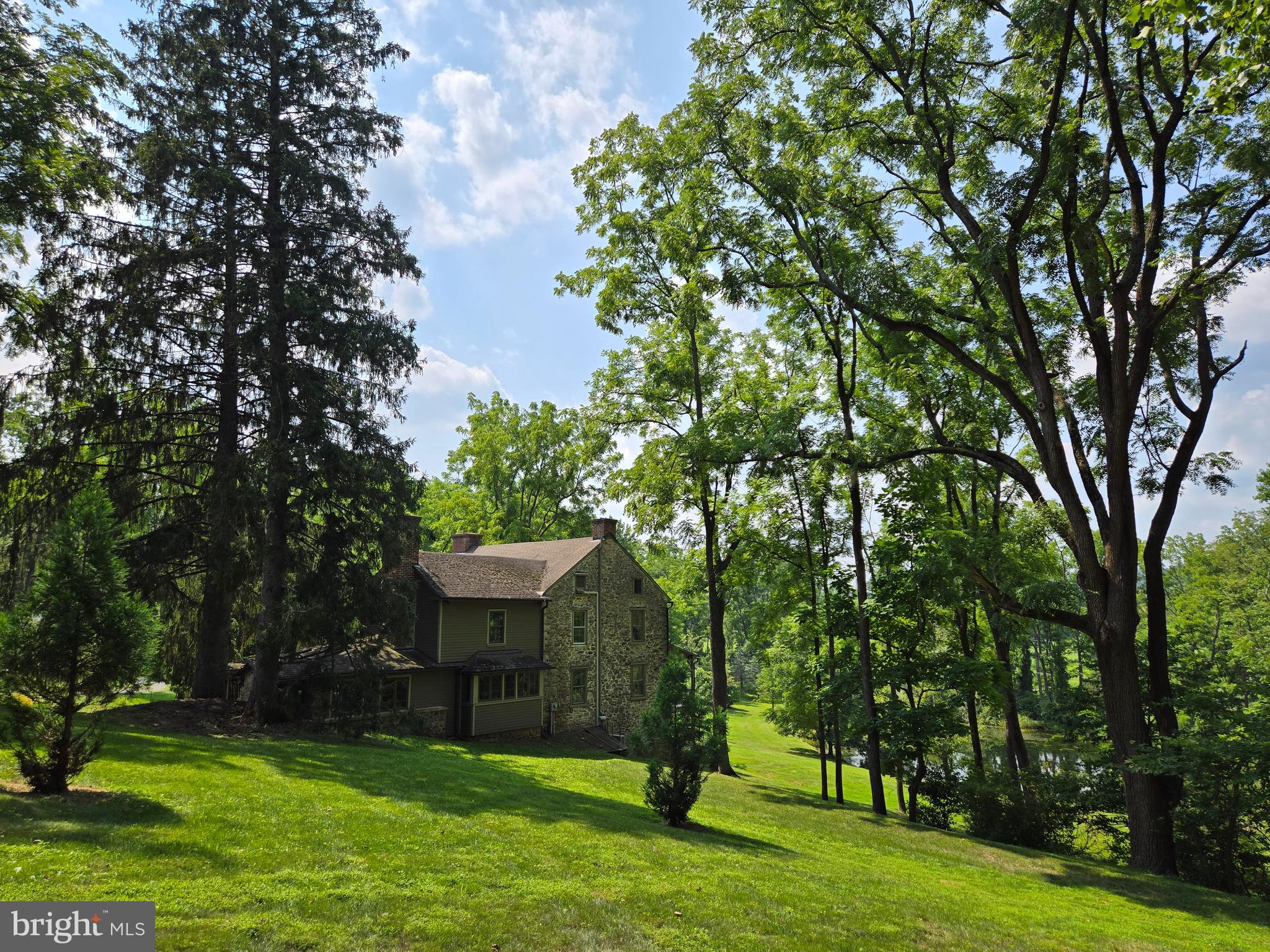 139 Mine Road Oley, PA 19547 - Photo 4 of 86 a view of a backyard with a garden