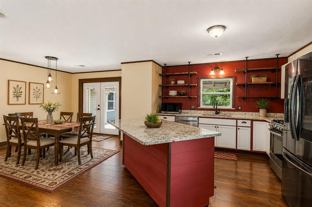 416 South Harrison Street Pilot Point, TX 76258 - Photo 5 of 20 Kitchen + Dining Area—Virtually Staged