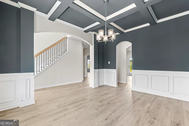 a view of a livingroom with wooden floor