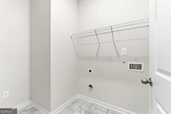 a view of a room with racks on the wall