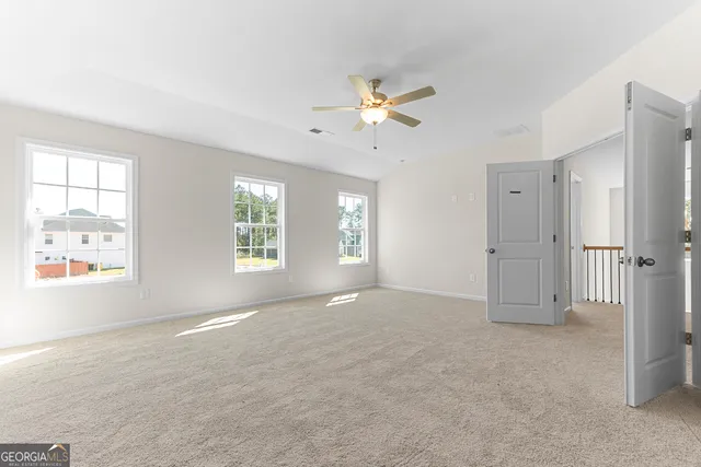 a view of a room with racks on the wall