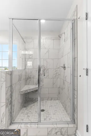 a view of a house with yard and deck