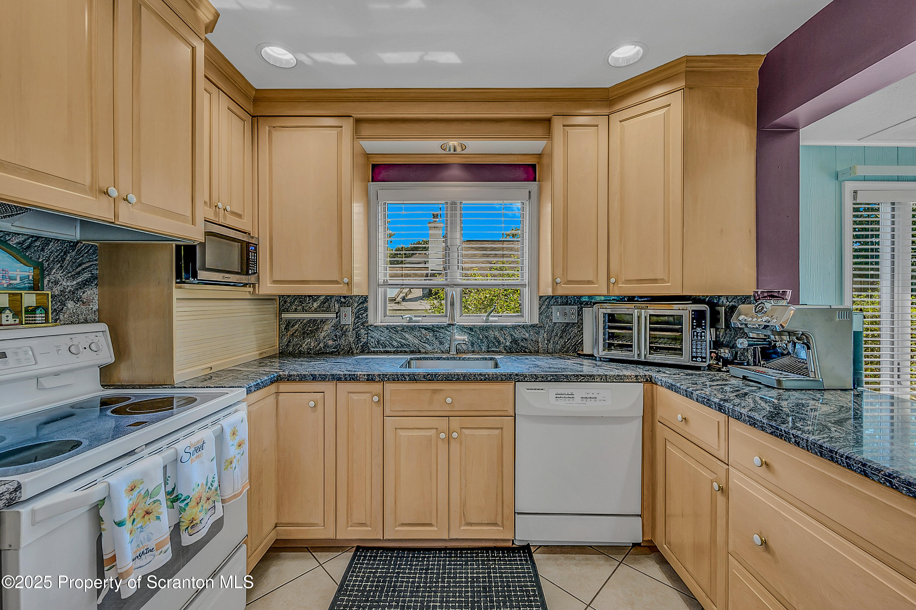 505 Main Avenue Clarks Summit, PA 18411 - Photo 20 of 76 a kitchen with sink cabinets and window