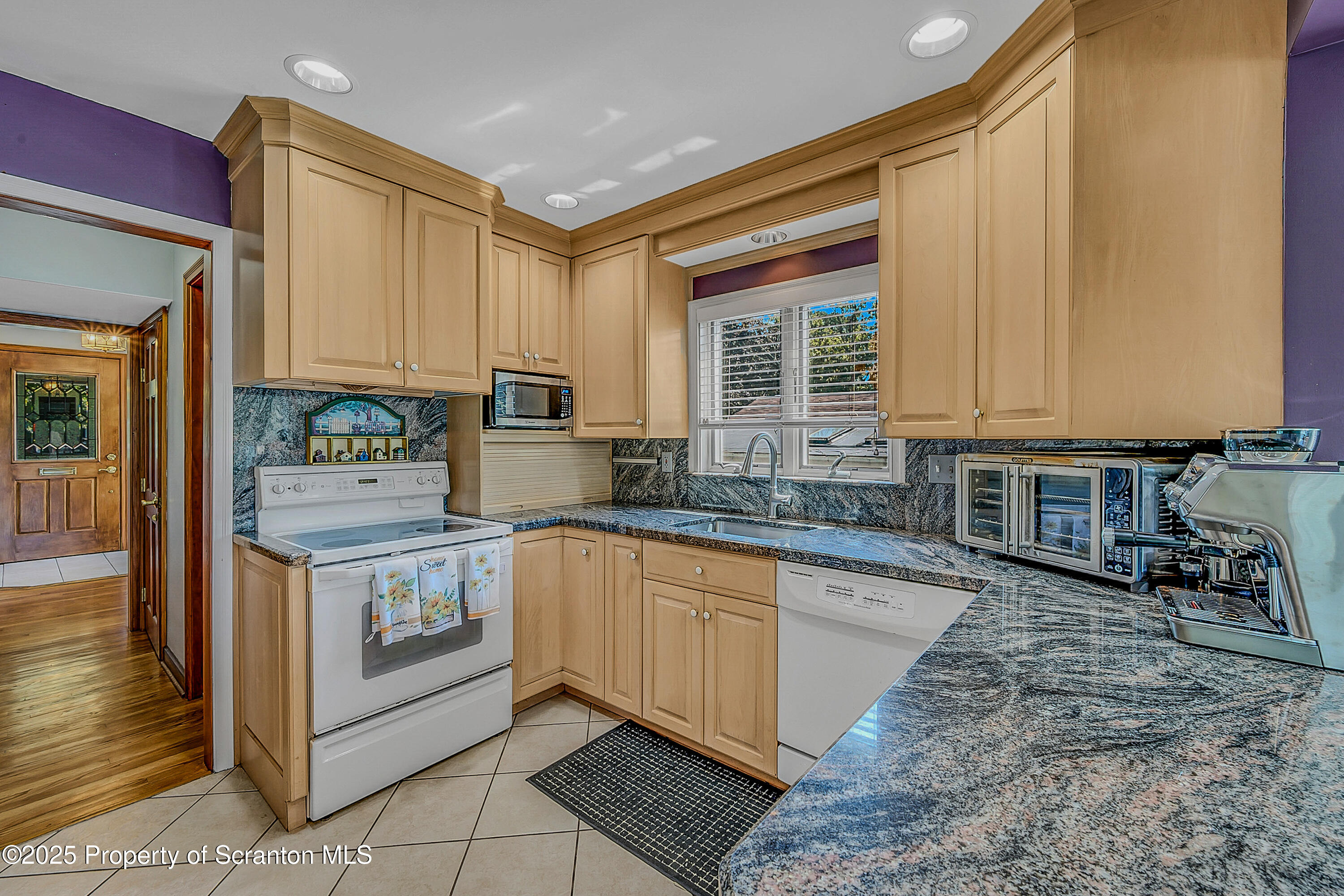 505 Main Avenue Clarks Summit, PA 18411 - Photo 22 of 76 a kitchen with stainless steel appliances granite countertop a stove a sink and a microwave