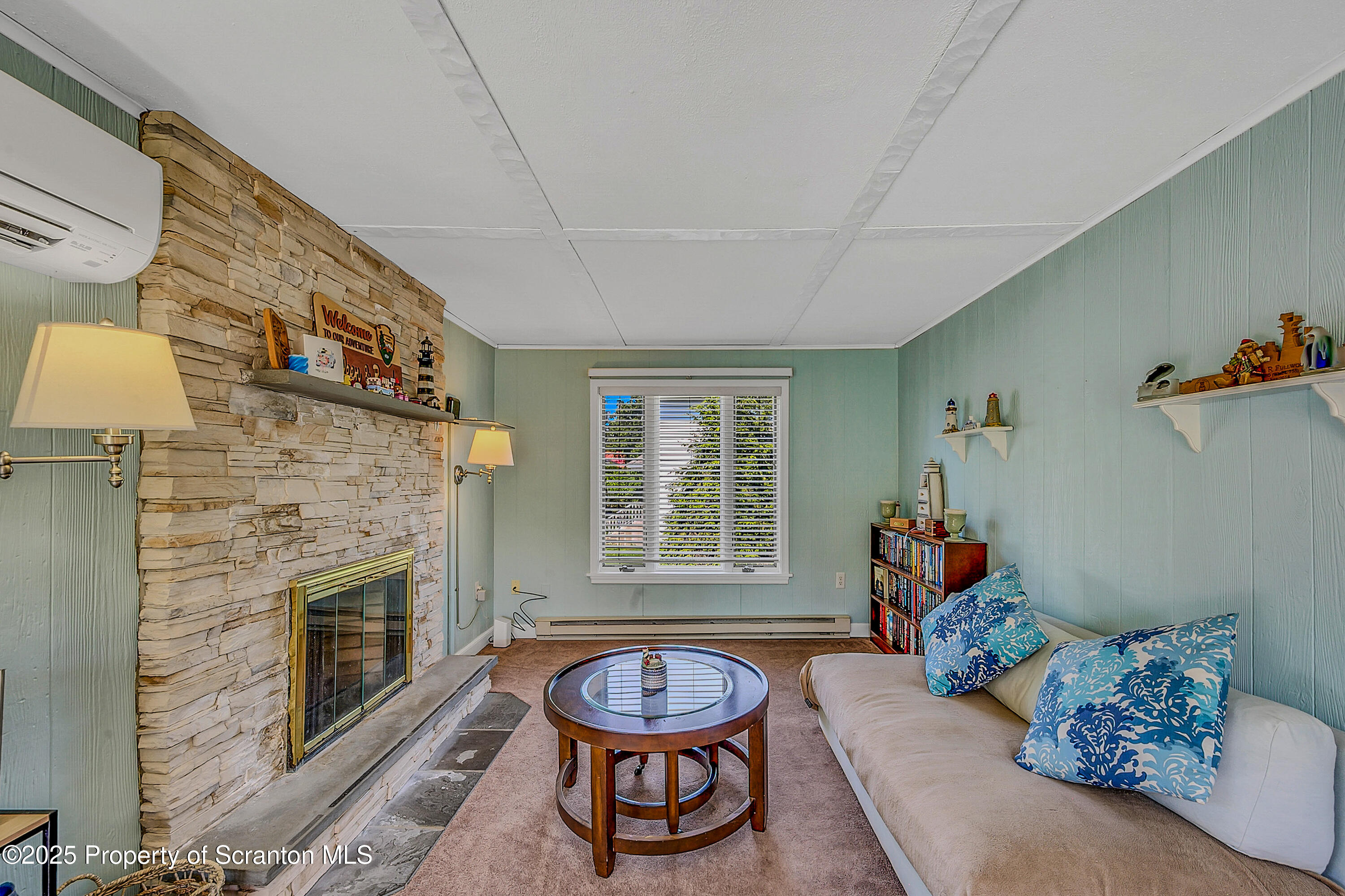 505 Main Avenue Clarks Summit, PA 18411 - Photo 25 of 76 a living room with furniture and a fireplace