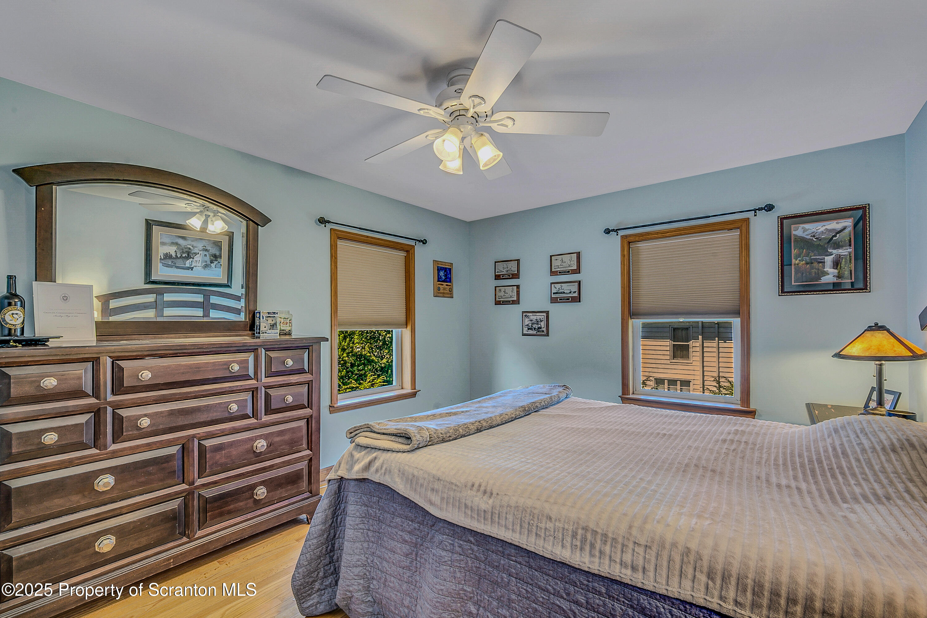 505 Main Avenue Clarks Summit, PA 18411 - Photo 36 of 76 a bedroom with a bed and a chandelier