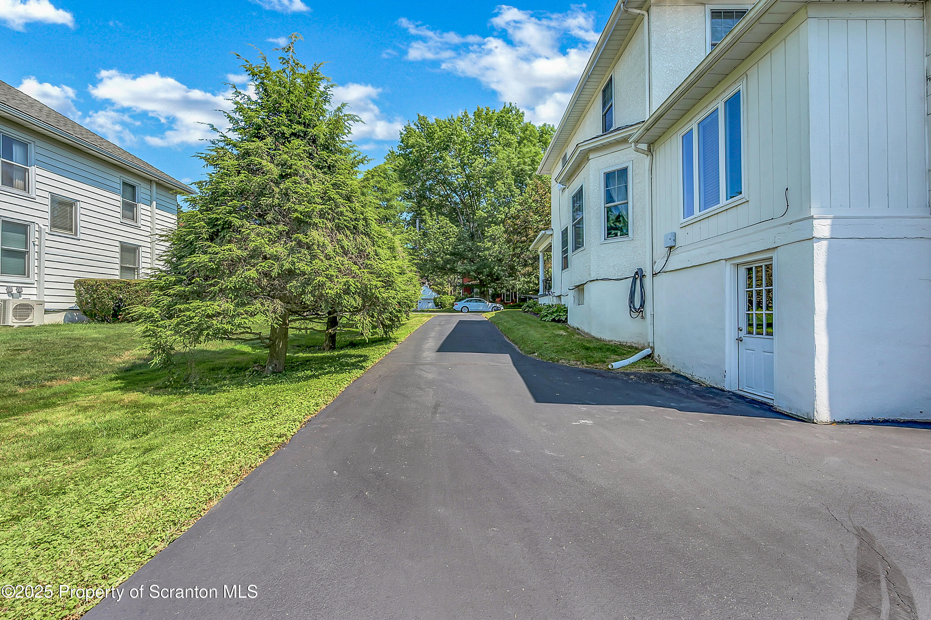 505 Main Avenue Clarks Summit, PA 18411 - Photo 4 of 76 a view of a house with a yard and pathway