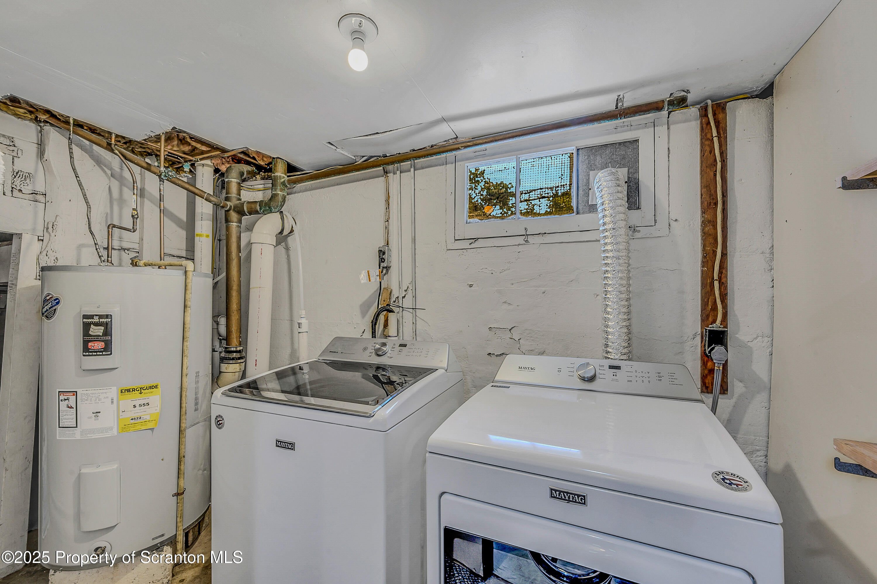 505 Main Avenue Clarks Summit, PA 18411 - Photo 42 of 76 a bathroom with a sink a refrigerator and a window