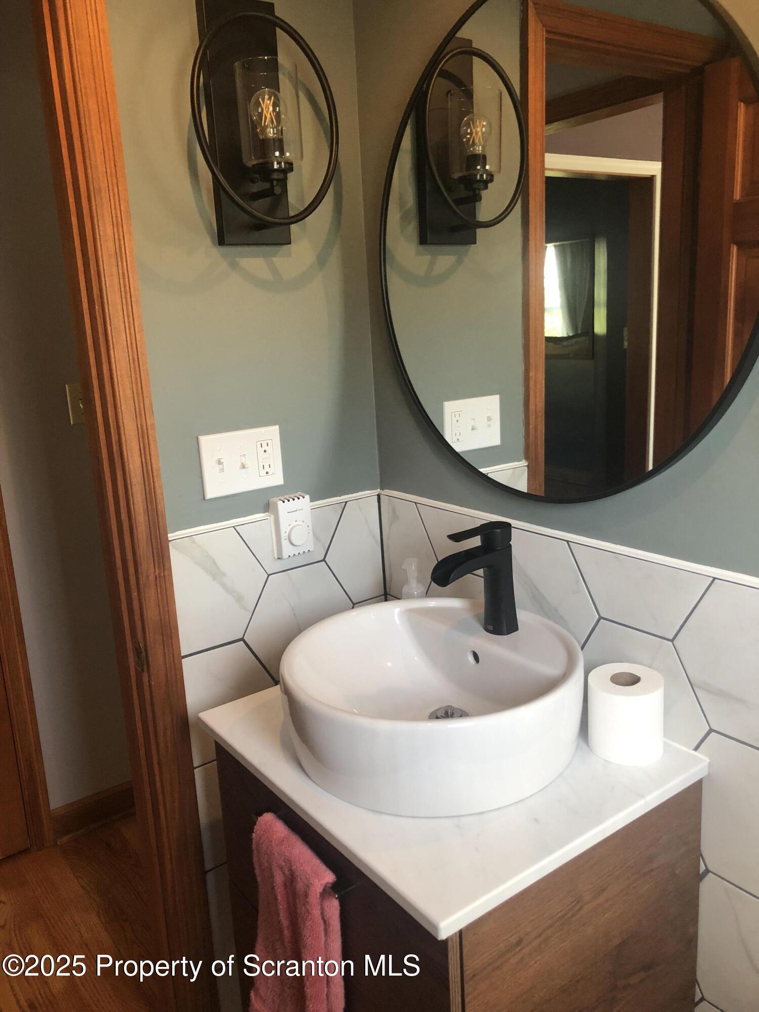 505 Main Avenue Clarks Summit, PA 18411 - Photo 55 of 76 a bathroom with a sink and a mirror