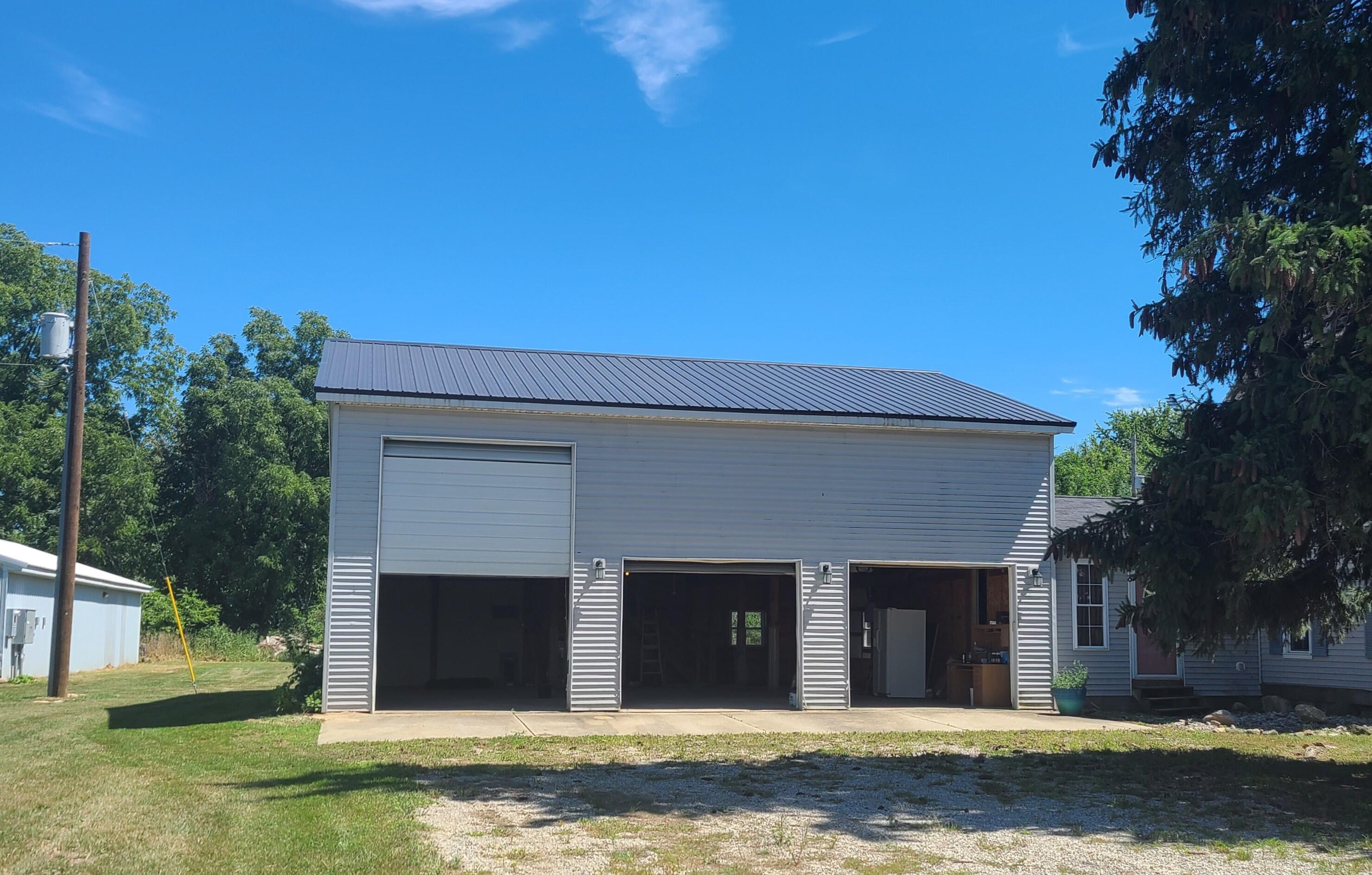 7607 Pendell Road Middleton, MI 48856 - Photo 5 of 47 3 Stall attached garage