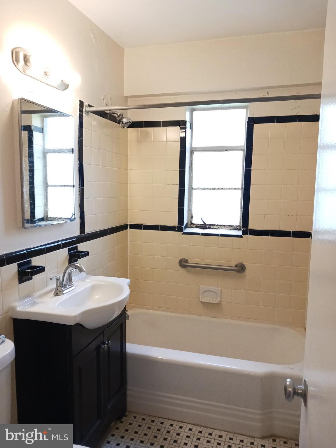 2500 Q Street Northwest, Unit 229 Washington, DC 20007 - Photo 16 of 41 bathroom with window, tub-shower