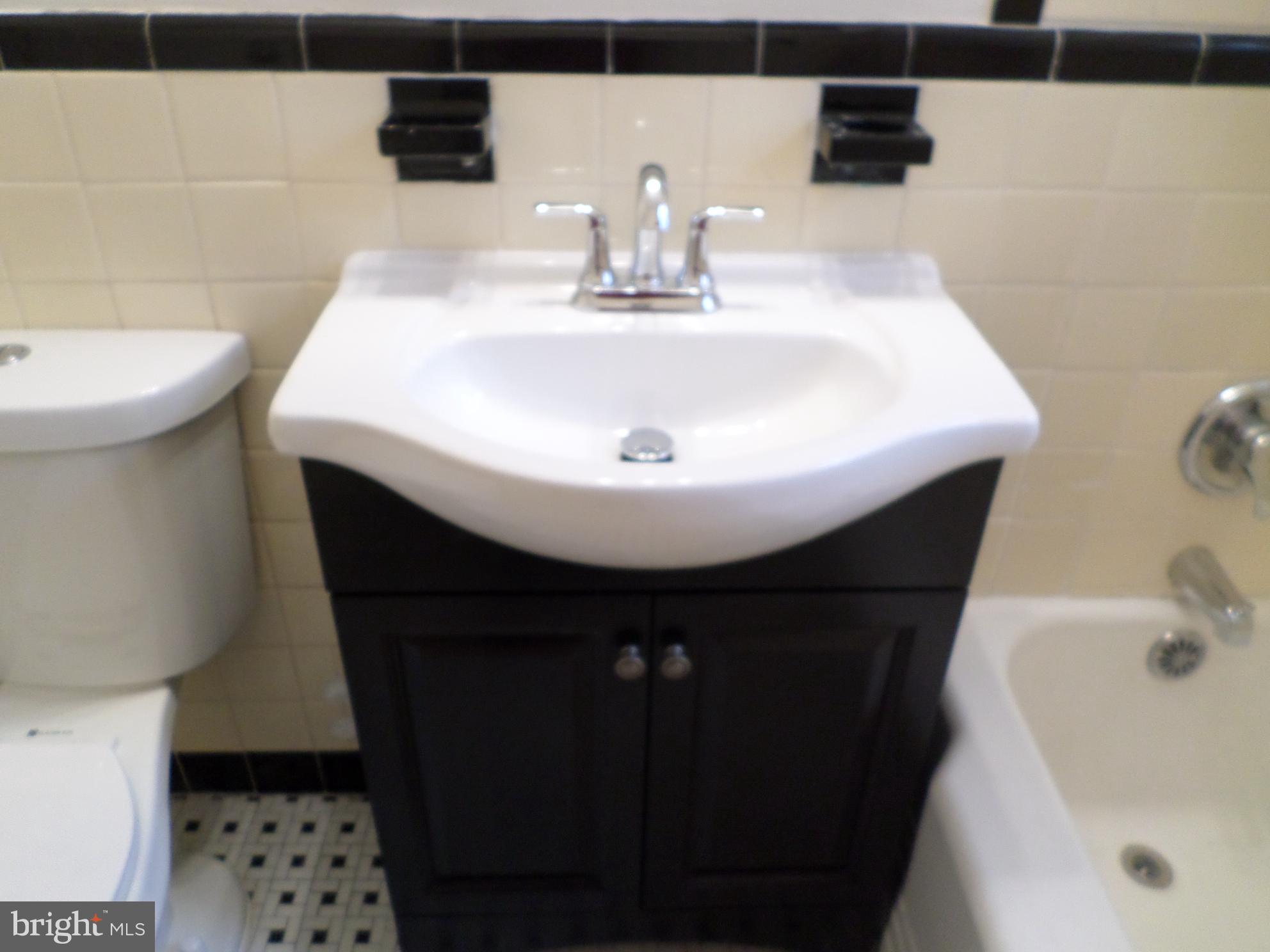 2500 Q Street Northwest, Unit 229 Washington, DC 20007 - Photo 17 of 41 bathroom sink