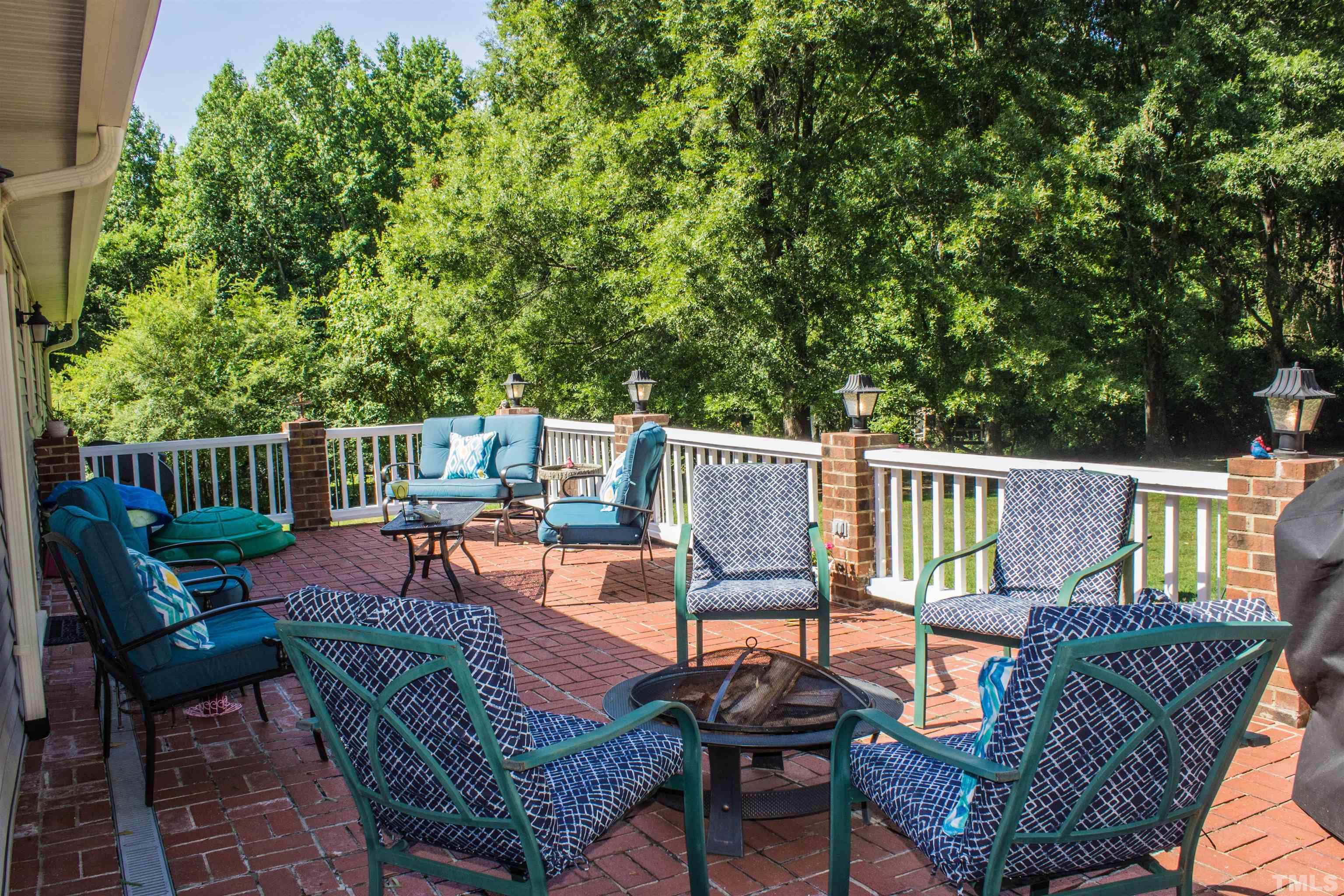 2102 Snow Hill Road Durham, NC 27712 - Photo 3 of 15 a view of a chairs and table in the patio