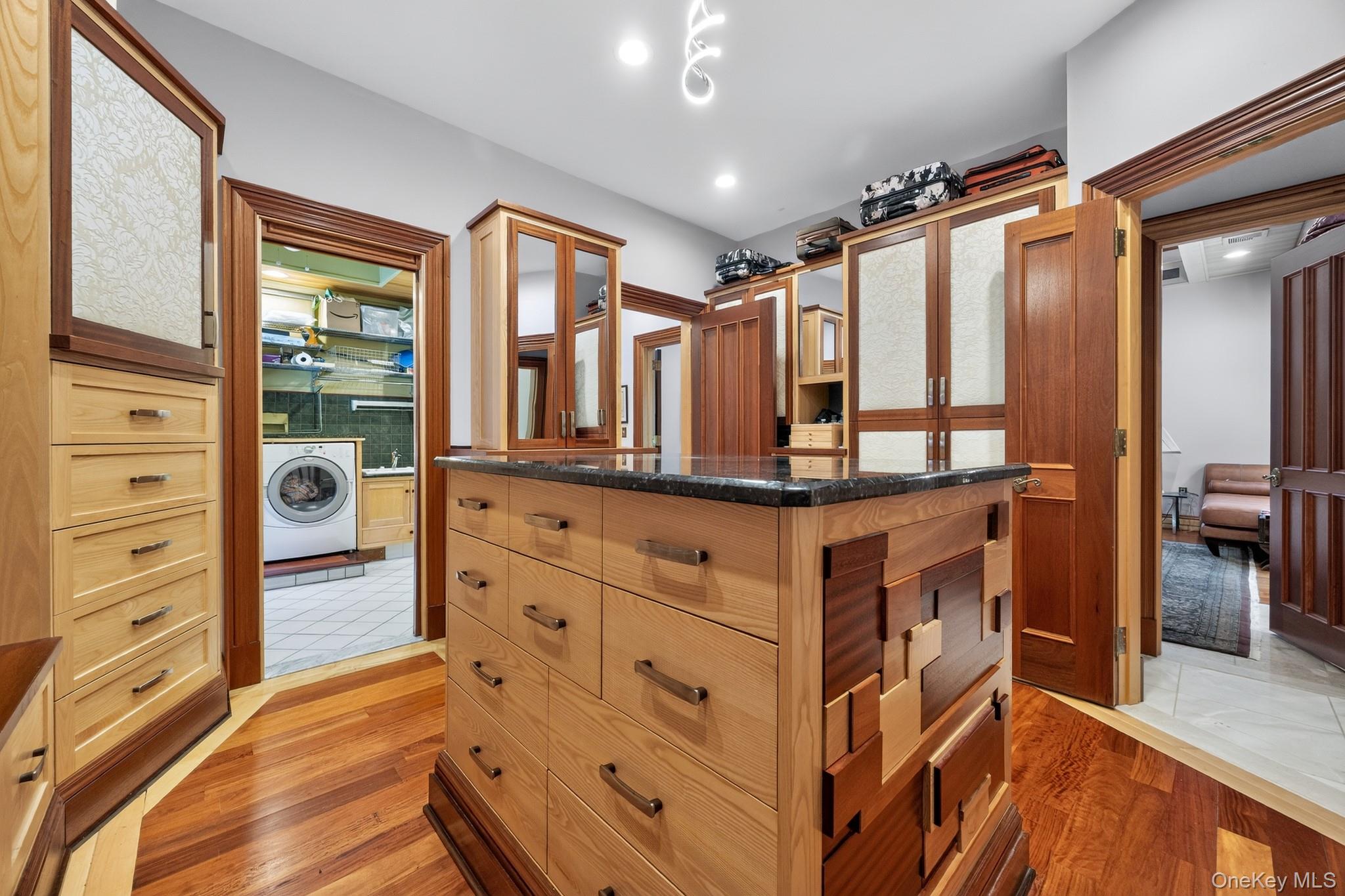 23 Inningwood Road Ossining, NY 10562 - Photo 31 of 50 Walk-in closet featuring a central island with a dark countertop and multiple drawers