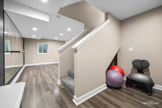a view of a living room and wooden floor