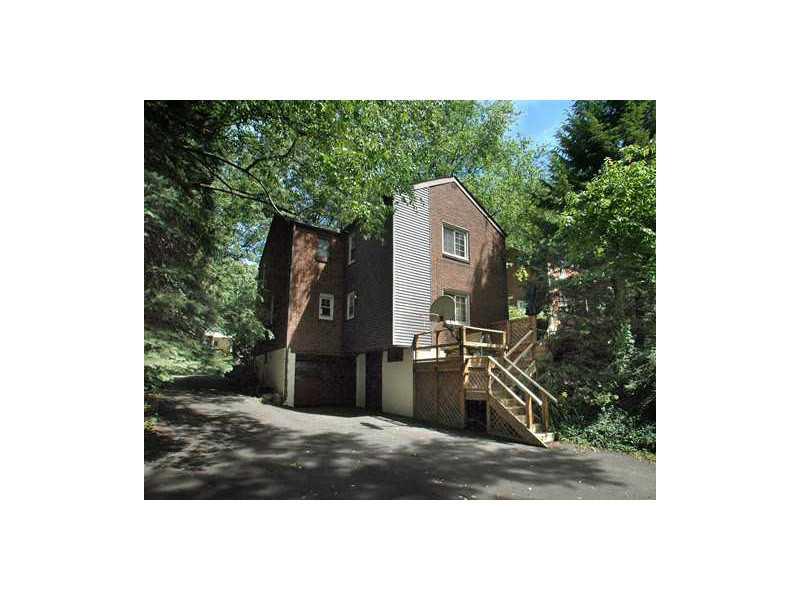315 Edgewood Road Forest Hills, PA 15221 - Photo 14 of 14 Exterior Back. This is a view of the deck and back of the house, nicely shaded by mature trees.