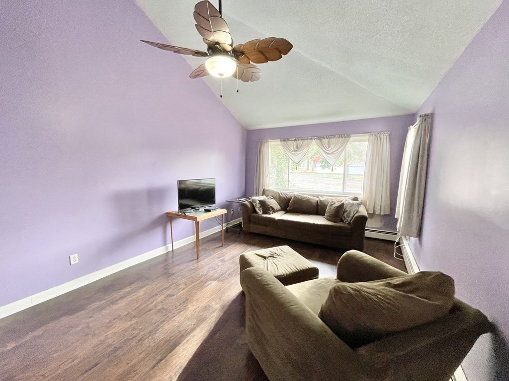 1107 James Street, Unit 1107 Chicopee, MA 01022 - Photo 12 of 26 a living room with furniture and a window