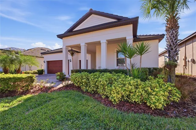 a view of a lake with a garden