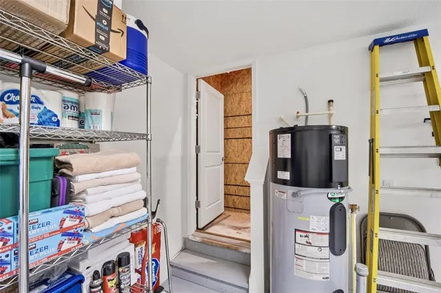 a view of a swimming pool with a table and chairs