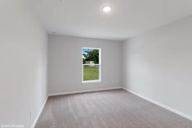 an empty room with a window