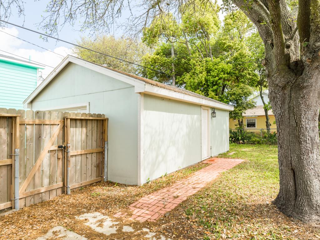 4528 Avenue R 1/2 Galveston, TX 77551 - Photo 8 of 22 a view of a house with a yard