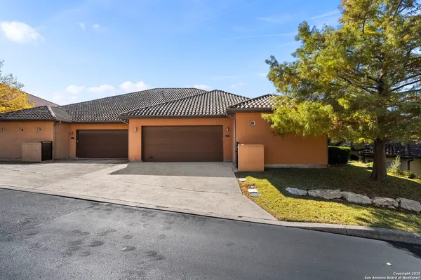 an aerial view of residential building and lake view