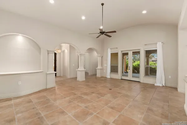 a view of a hallway with a chandelier