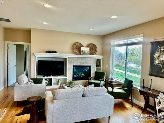a bathroom with a sink vanity mirror and toilet