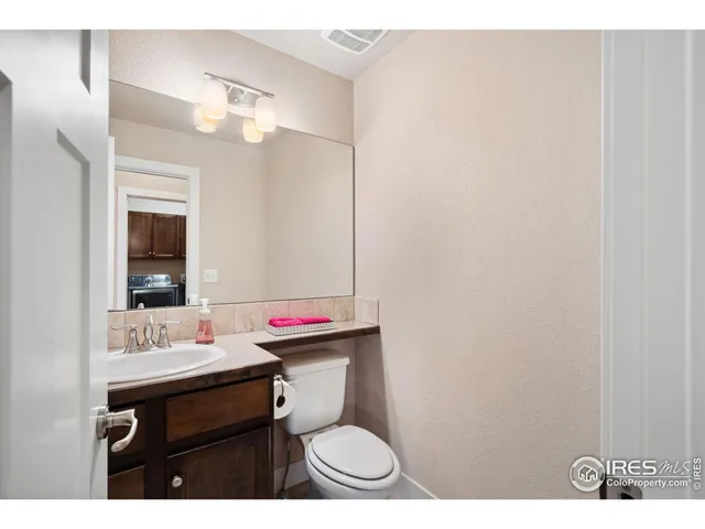 a view of storage and utility room with washer and dryer