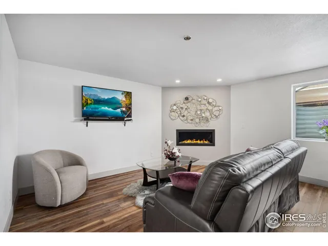 a bathroom with a sink toilet a mirror and shower