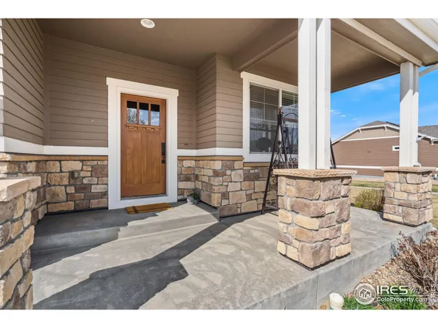 a bedroom with furniture and window