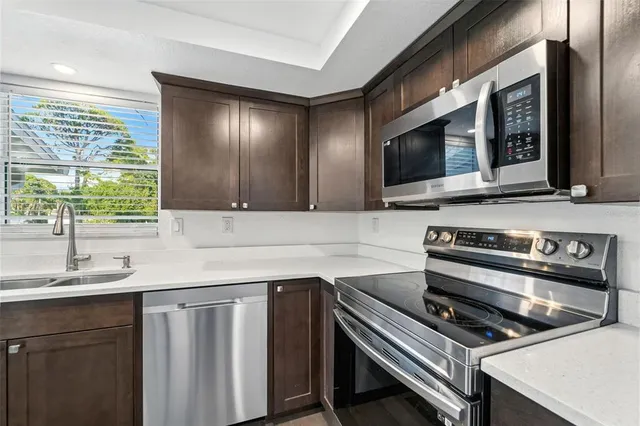 a view of a two chairs in the balcony