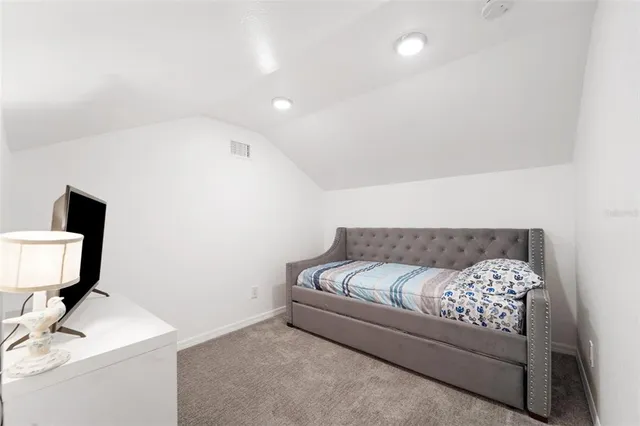 a bathroom with a shower and toilet