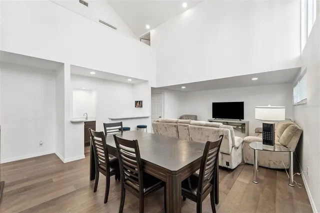 a kitchen with a sink cabinets and a stove