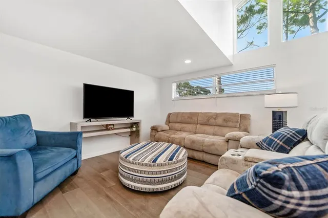 a kitchen with stainless steel appliances a refrigerator and a stove top oven