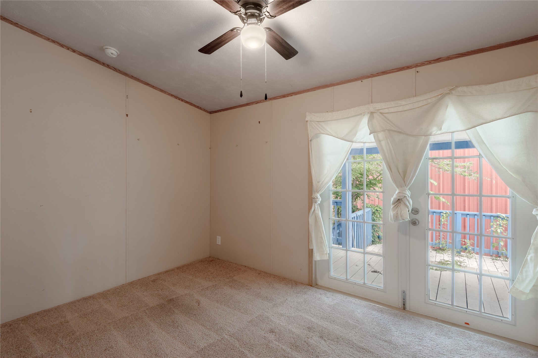 21 Oahu Court Point Blank, TX 77364 - Photo 21 of 45 Bedroom 2 offers French doors with direct access to the wrap around porch