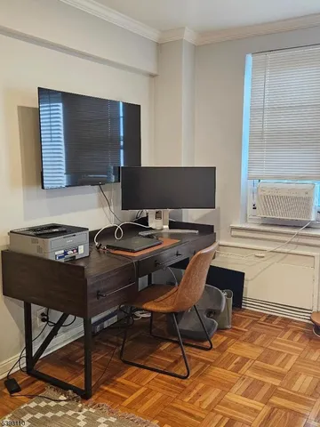 a workspace with furniture and rug