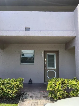 a kitchen with stainless steel appliances granite countertop a stove a sink dishwasher and a refrigerator