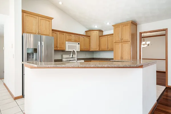 a bathroom with a sink vanity and a mirror