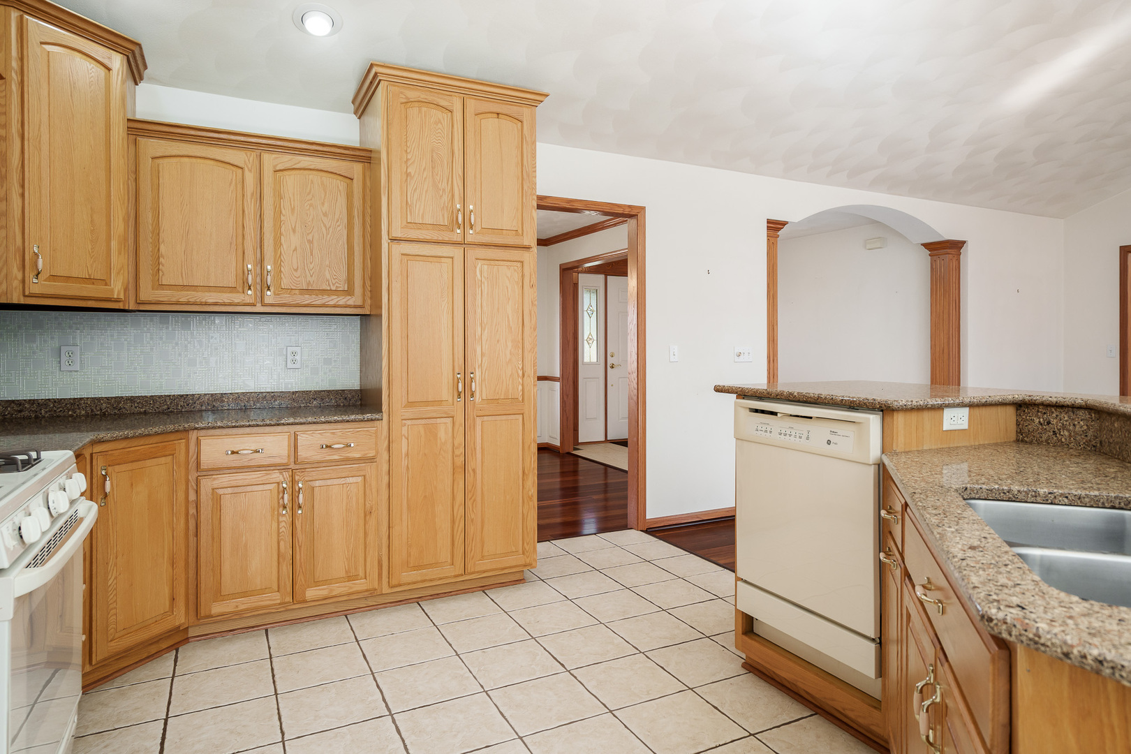 261 West Redtail Lane Oregon, IL 61061 - Photo 15 of 63 a kitchen with stainless steel appliances granite countertop a refrigerator and a stove top oven