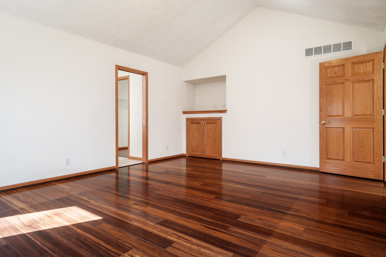 261 West Redtail Lane Oregon, IL 61061 - Photo 25 of 63 a view of an empty room with wooden floor and a window