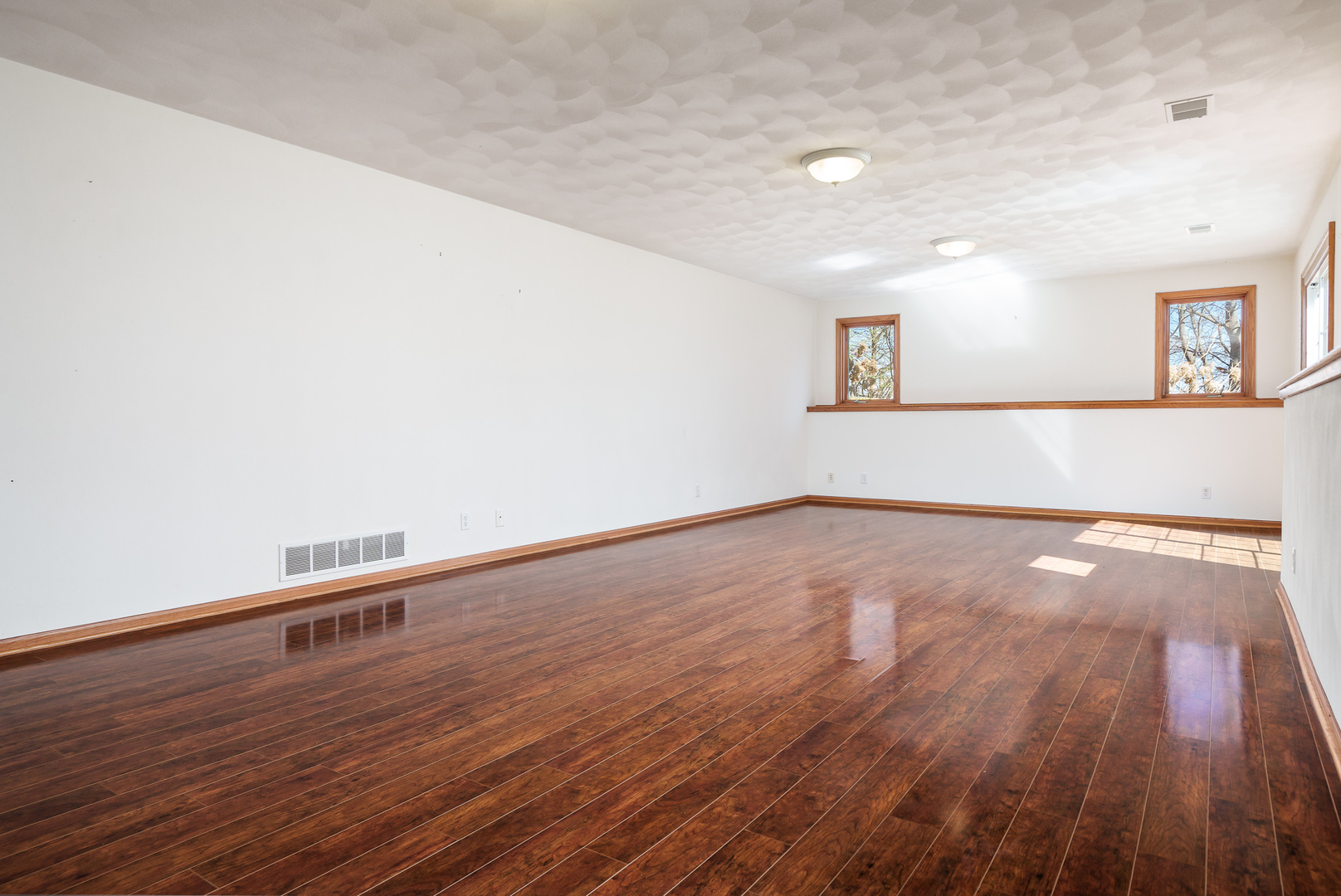 261 West Redtail Lane Oregon, IL 61061 - Photo 40 of 63 a view of empty room with wooden floor