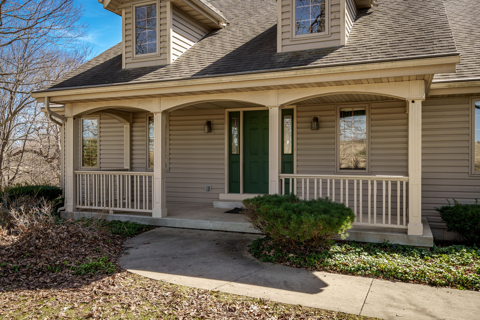 261 West Redtail Lane Oregon, IL 61061 - Photo 4 of 63 a view of a house with potted plants and a bench