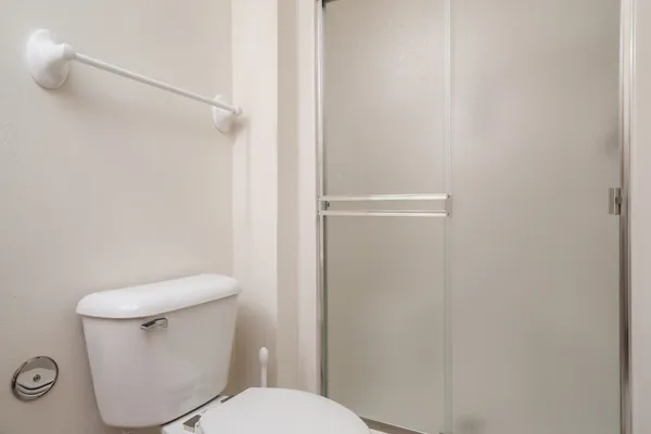 a view of a room with wooden walls