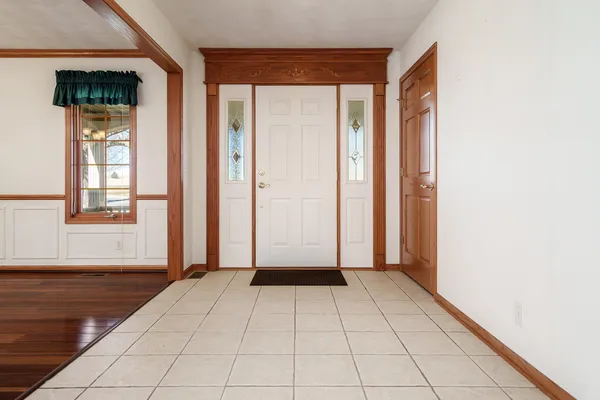 a close view of a fireplace in an empty room